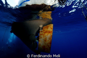 Diving boat from below... by Ferdinando Meli 